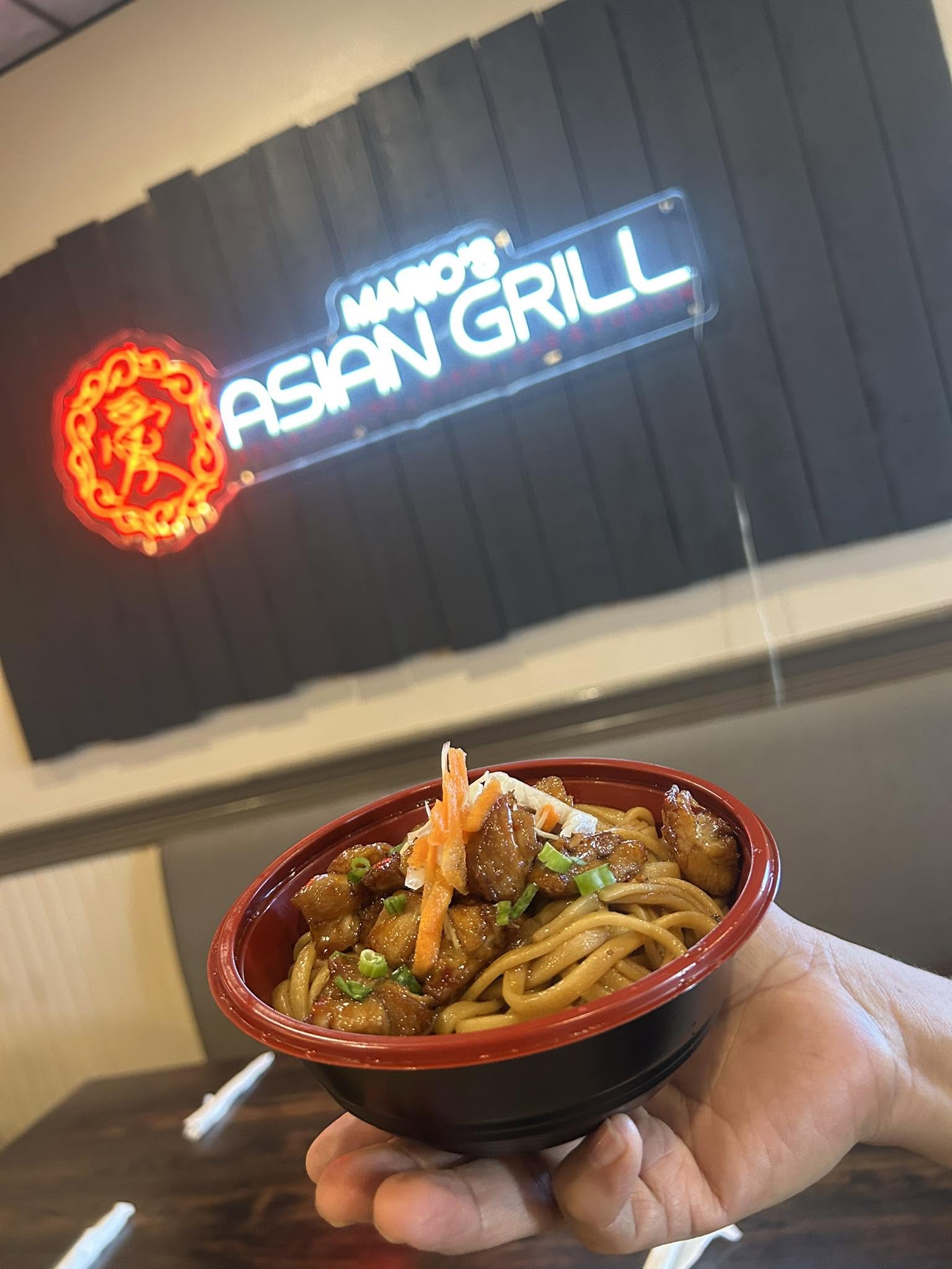 Mario's Asian Grill neon sign interior